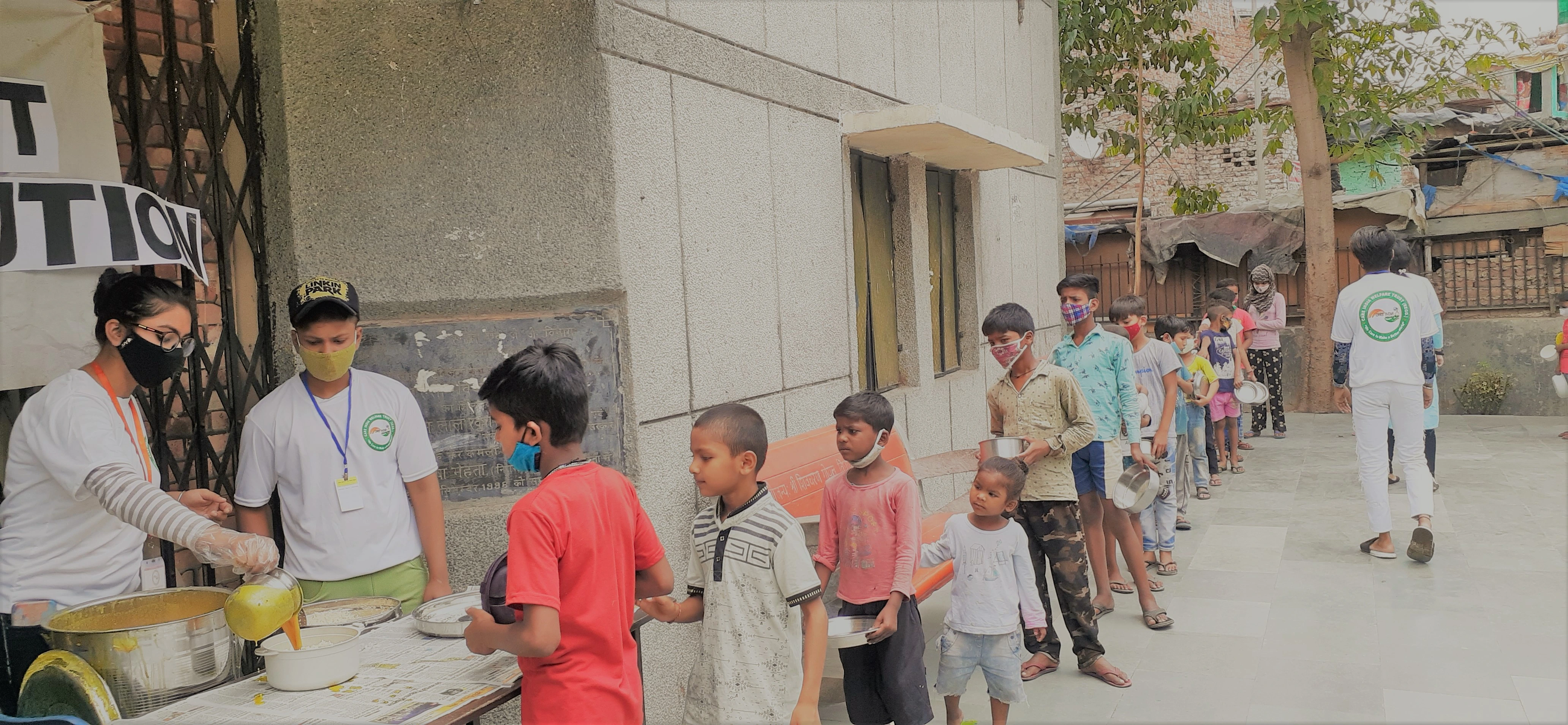 care india welfare trust feeding food to children